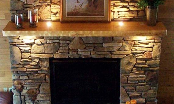 Облицовка камина искусственным камнем фото