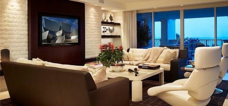 Телевизор в гостиной на стене